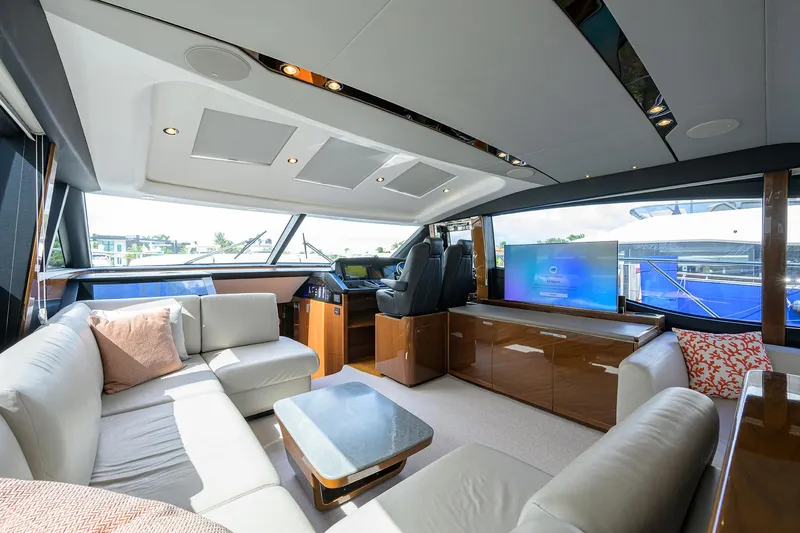 Slide: The Image of Luxurious interior of 2018 Princess 65S yacht with modern seating and entertainment system. - 10