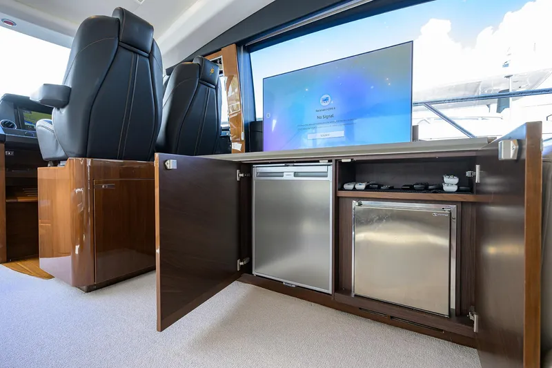Slide: The Image of Luxurious interior of 2018 Princess 65S yacht with modern appliances and seating. - 12