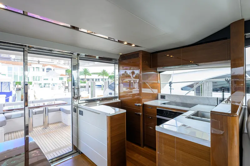 Slide: The Image of Luxurious interior of 2018 Princess 65S yacht with modern kitchen and marina view. - 14