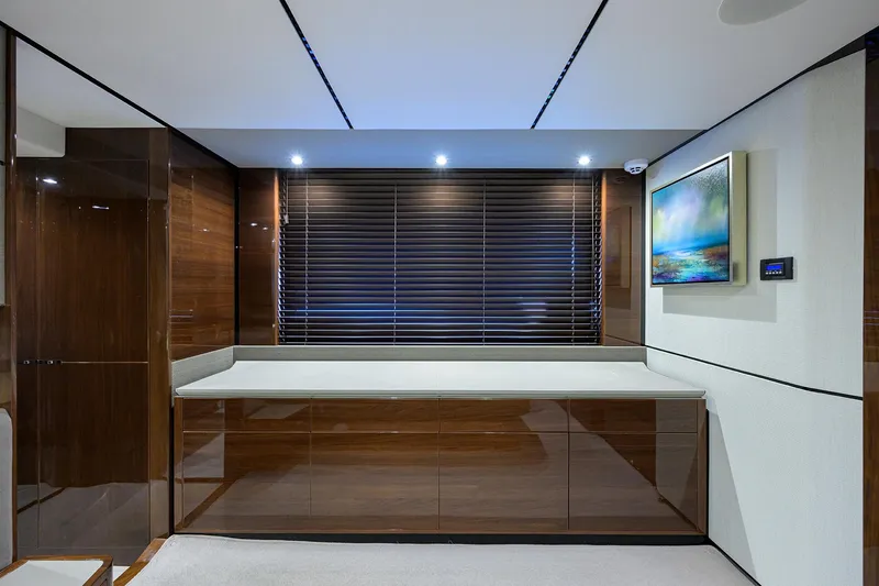 Slide: The Image of Luxurious interior of 2018 Princess 65S yacht with sleek wood finishes and modern decor. - 23