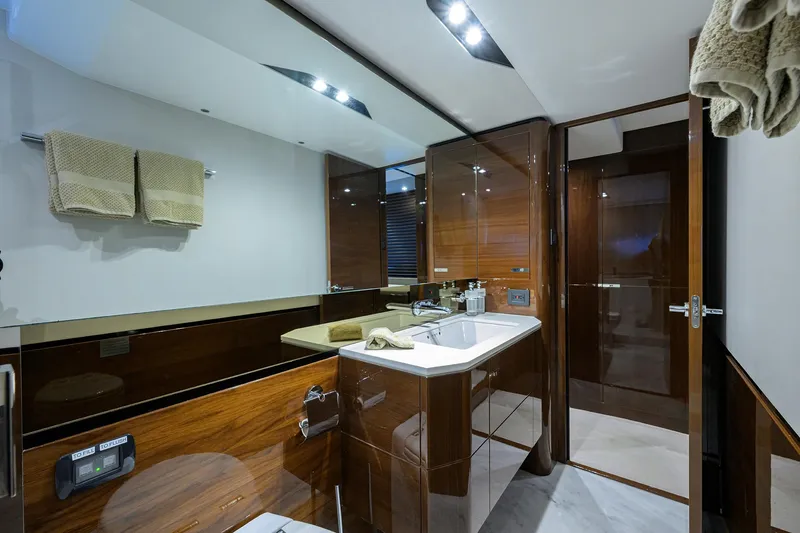 Slide: The Image of Luxurious bathroom interior of 2018 Princess 65S yacht with modern fixtures and wooden accents. - 25
