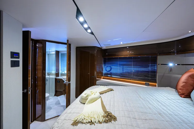 Slide: The Image of Luxurious bedroom interior of 2018 Princess 65S yacht with modern design and ambient lighting. - 27