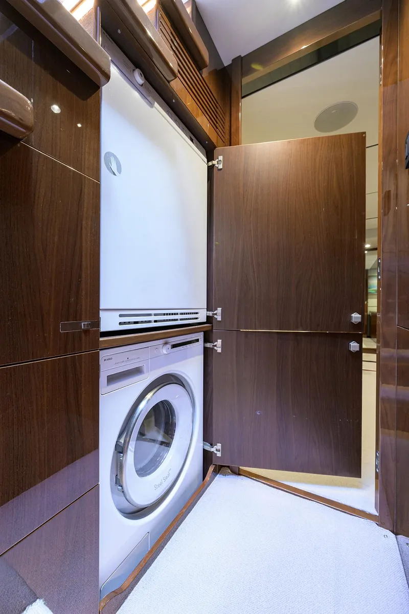 Slide: The Image of Laundry area with a washing machine in a 2018 Princess 65S yacht. - 34