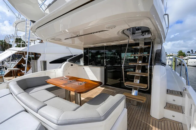 Slide: The Image of Luxurious 2018 Princess 65S yacht with elegant outdoor seating and sleek design. - 35