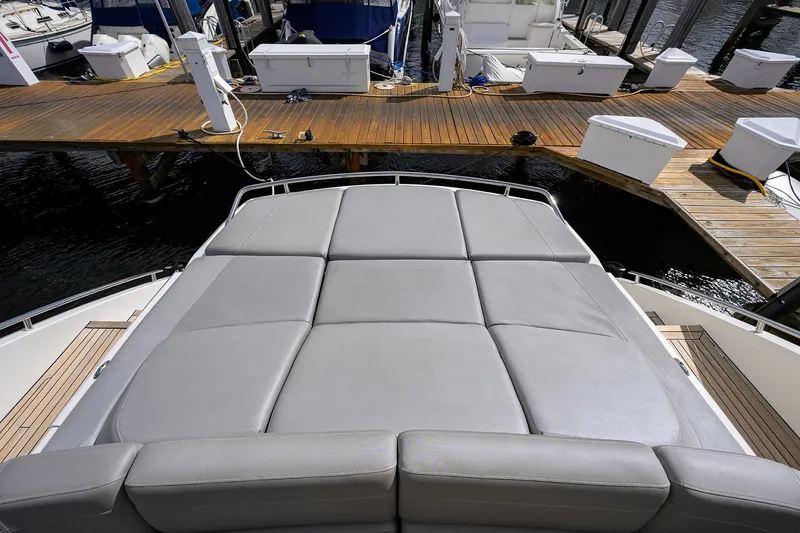 Slide: The Image of Luxurious 2018 Princess 65S yacht with spacious sunbathing deck at marina. - 40