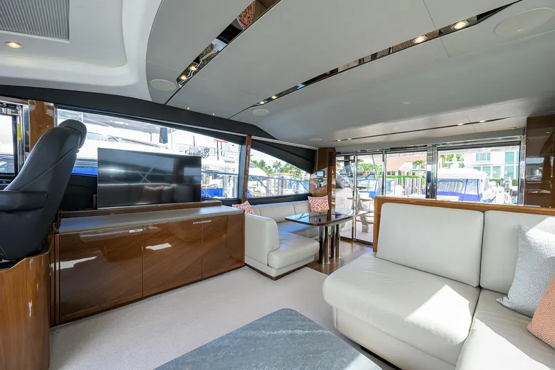 Slide: The Image of Luxurious interior of 2018 Princess 65S yacht with modern furnishings and large windows. - 9