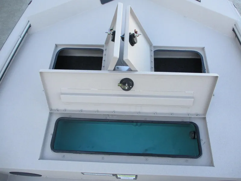 Slide: The Image of Avid 18 Rogue SC 2025 boat storage compartments and livewell. - 10