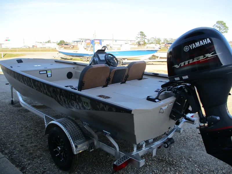 Slide: The Image of 2025 Avid 18 Rogue SC boat with Yamaha VMAX engine on trailer. - 6
