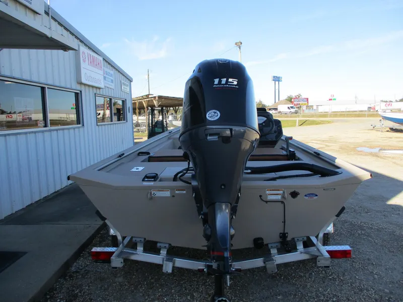 Slide: The Image of Avid 18 Rogue SC 2025 boat with 115 HP engine on trailer. - 7