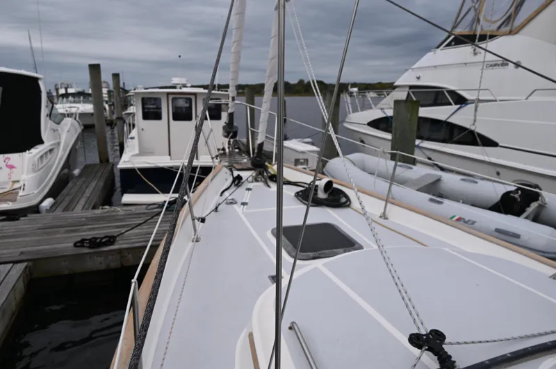 Slide: The Image of 1984 Southern Cross 39 sailboat docked at marina, overcast sky. - 13