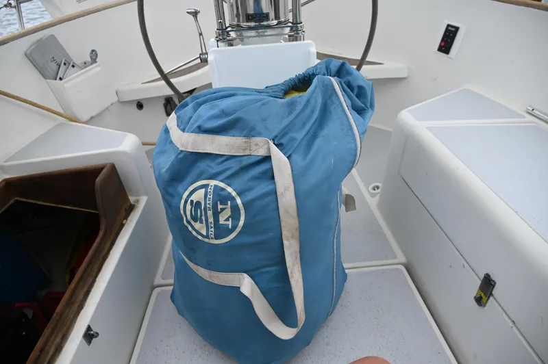 Slide: The Image of Blue sail bag in the cockpit of a 1984 Southern Cross 39 sailboat. - 28