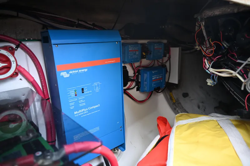Slide: The Image of Electrical system setup in a 1984 Southern Cross 39 sailboat, featuring Victron Energy components. - 29