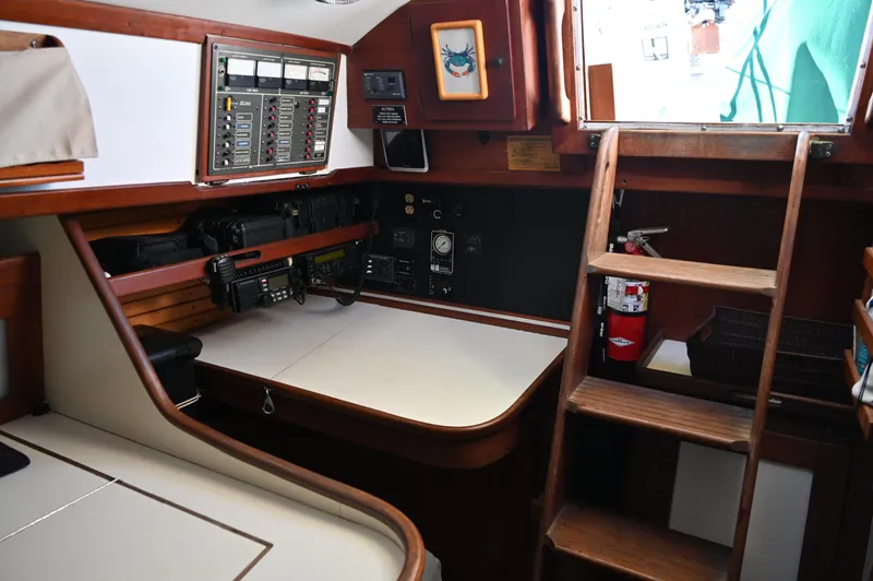 Slide: The Image of Interior of 1984 Southern Cross 39 sailboat with navigation station and wooden ladder. - 41