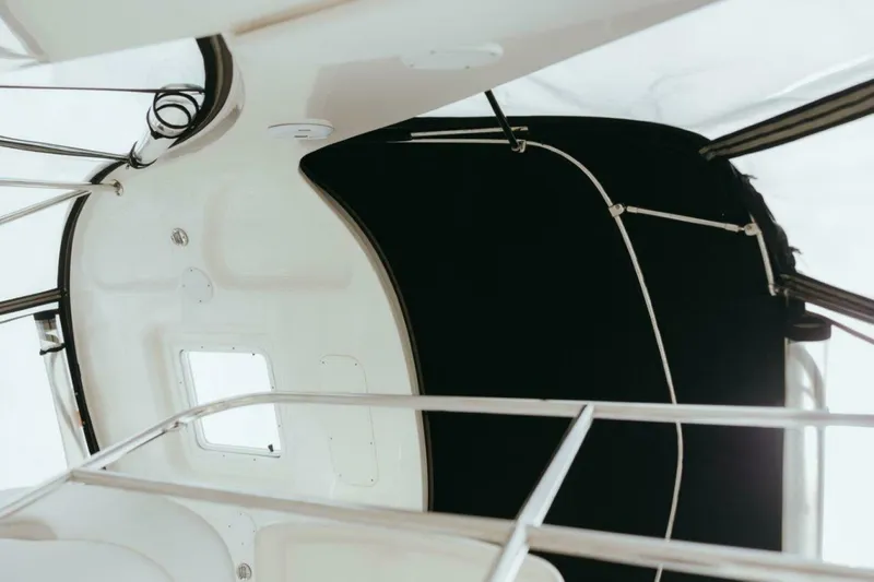 Slide: The Image of Interior view of 2010 Sea Ray 390 Sedan Bridge boat, featuring sleek design elements. - 21