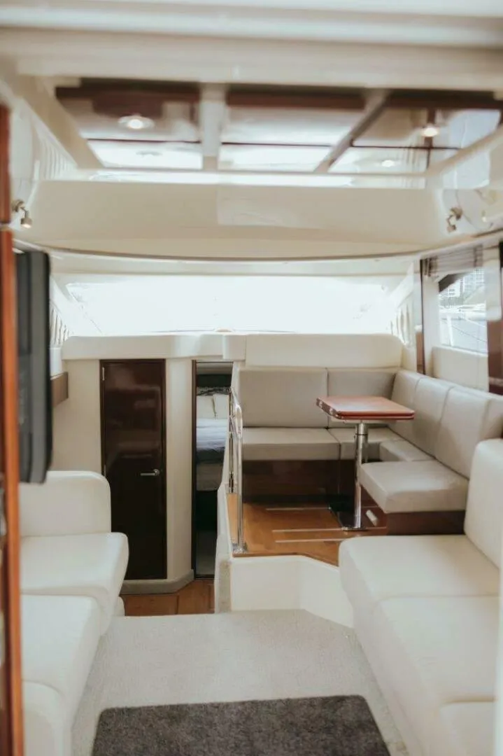 Slide: The Image of Luxurious interior of 2010 Sea Ray 390 Sedan Bridge yacht. - 9