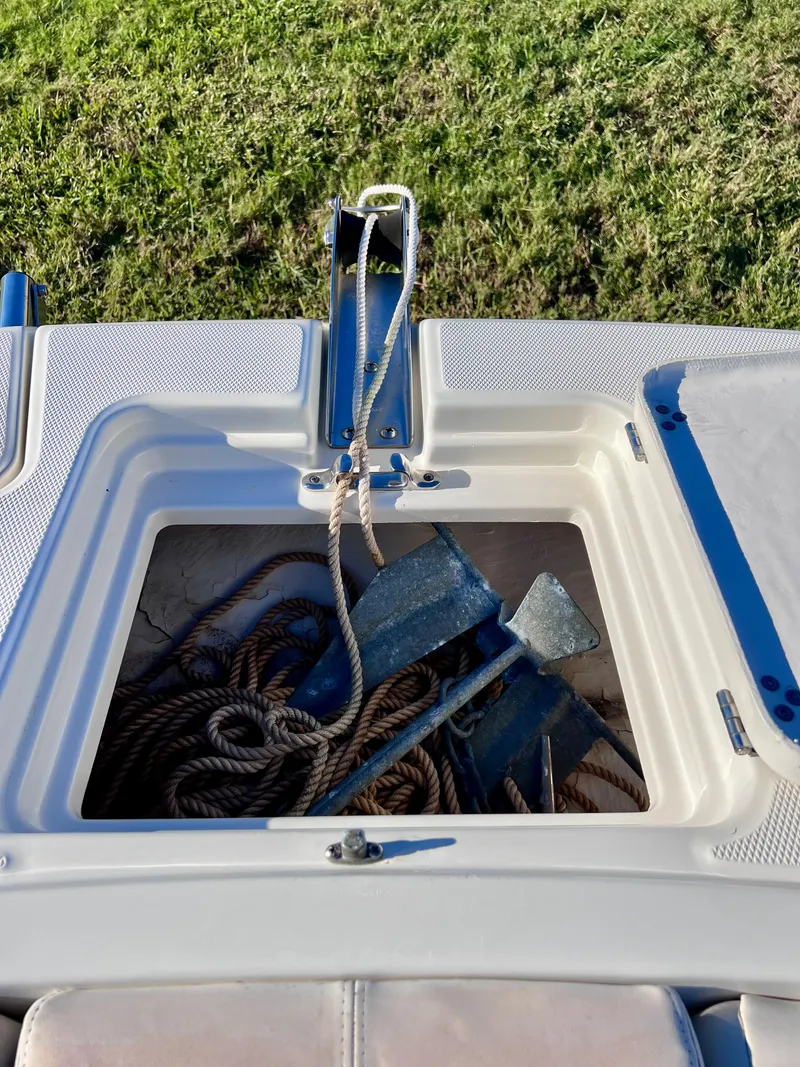 Slide: The Image of Anchor and rope storage on 2015 Carolina Cat 23 SD boat. - 22