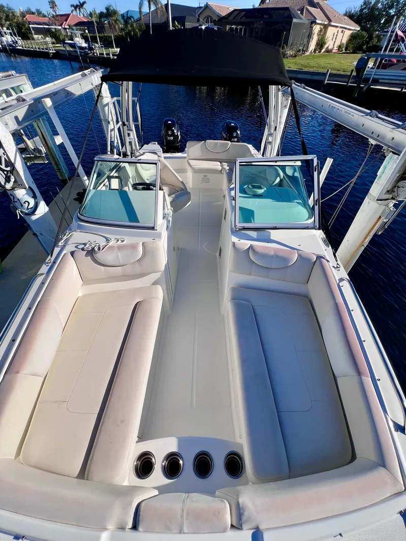 Slide: The Image of 2015 Carolina Cat 23 SD boat with spacious seating and dual consoles. - 24