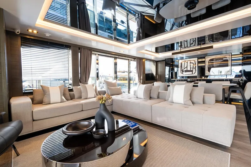 Slide: The Image of Luxurious interior of 2025 Pearl 95 yacht with modern decor and spacious seating. - 25