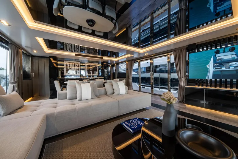 Slide: The Image of Luxurious interior of 2025 Pearl 95 yacht with modern furnishings and elegant lighting. - 28