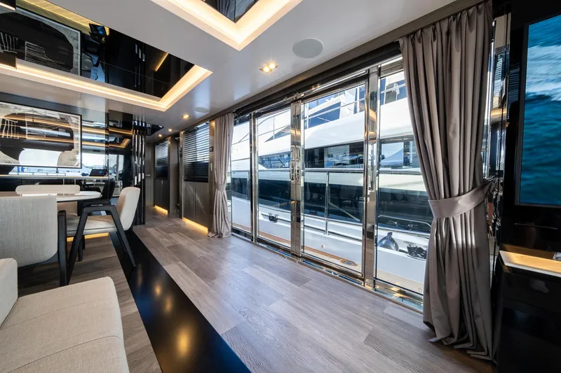 Slide: The Image of Luxurious interior of 2025 Pearl 95 yacht with modern design and large windows. - 30