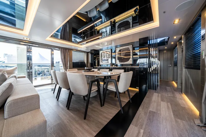 Slide: The Image of Luxurious interior of 2025 Pearl 95 yacht with modern dining area and elegant design. - 31