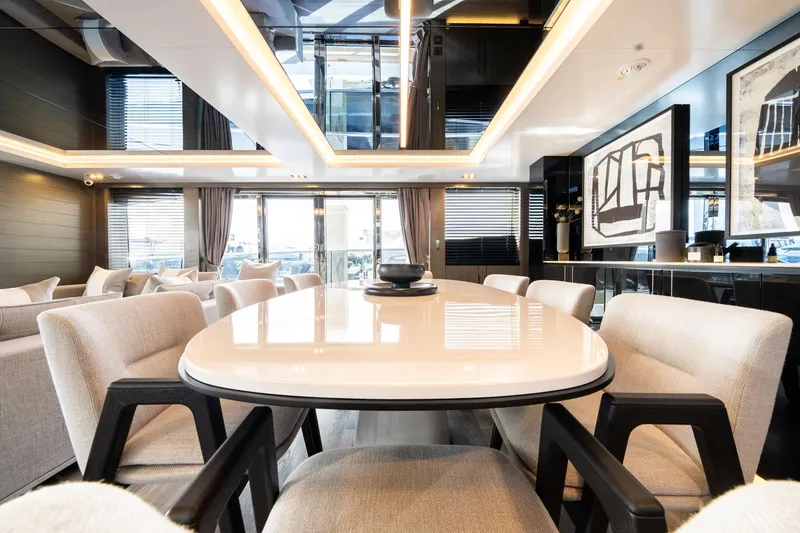 Slide: The Image of Luxurious interior of 2025 Pearl 95 yacht with elegant dining area and modern decor. - 33