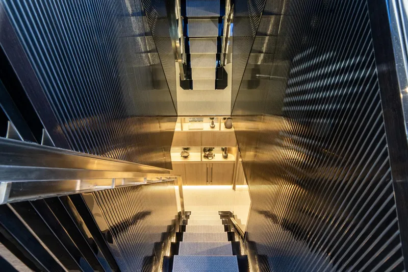 Slide: The Image of Futuristic escalator with metallic design, Pearl 95, 2025 model. - 35