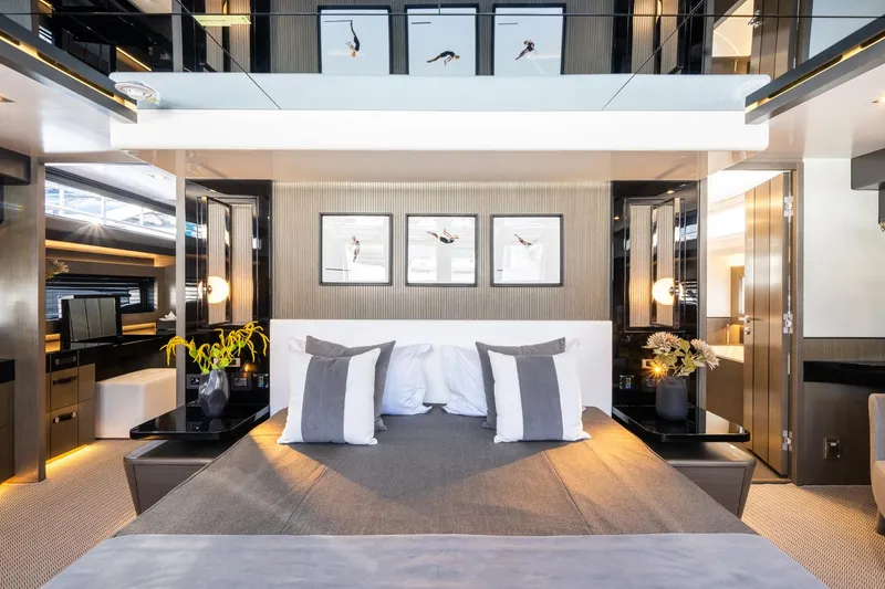 Slide: The Image of Luxurious bedroom interior in 2025 Pearl 95 yacht, featuring modern decor and elegant lighting. - 45