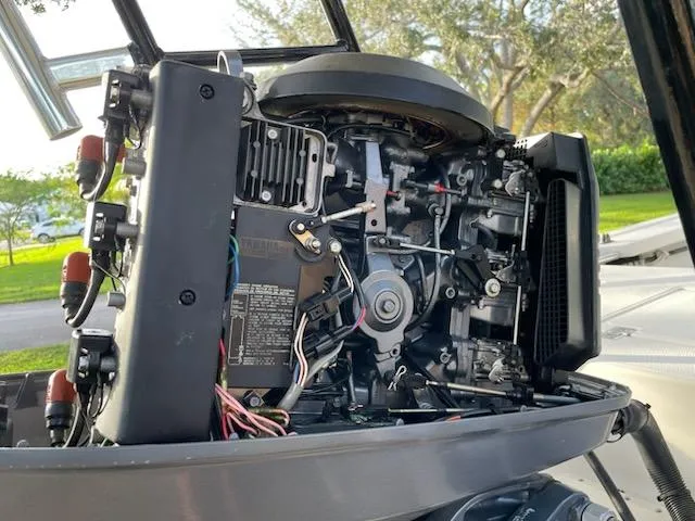 Slide: The Image of 1998 Hewes Bayfisher boat engine, detailed view of internal components. - 13