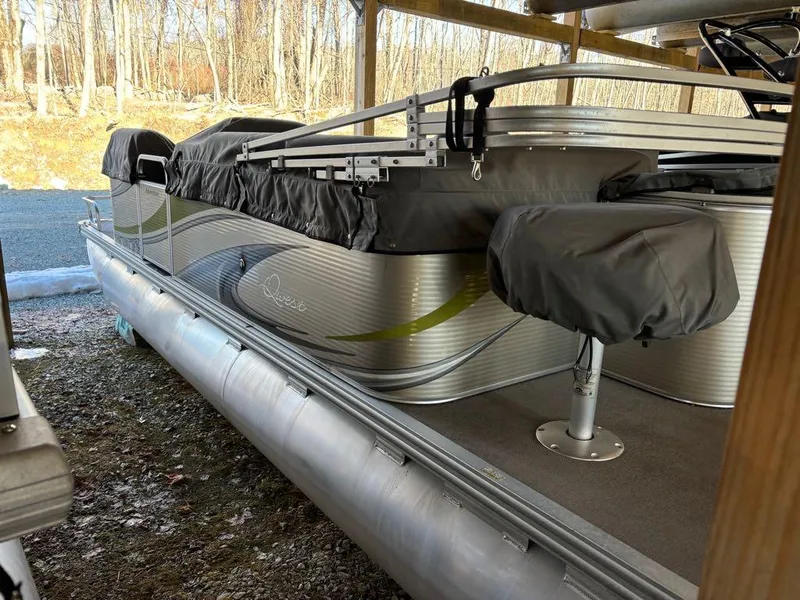 Slide: The Image of 2015 Apex Marine Qwest Adventure 820 Sport Cruise pontoon boat in storage. - 16