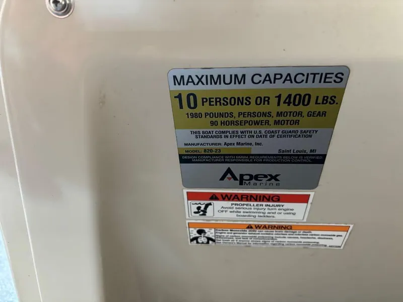 Slide: The Image of Capacity label on 2015 Apex Marine Qwest Adventure 820 Sport Cruise Adv boat. - 9