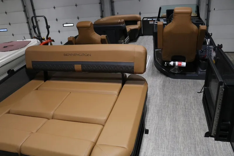 Slide: The Image of 2025 Bennington 22 M Swingback boat interior with tan leather seating. - 21