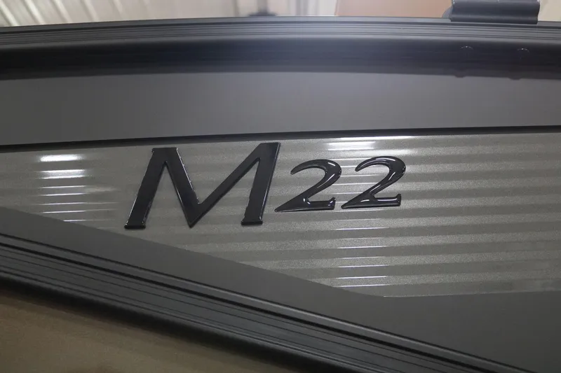 Slide: The Image of 2025 Bennington 22 M Swingback boat model emblem. - 5