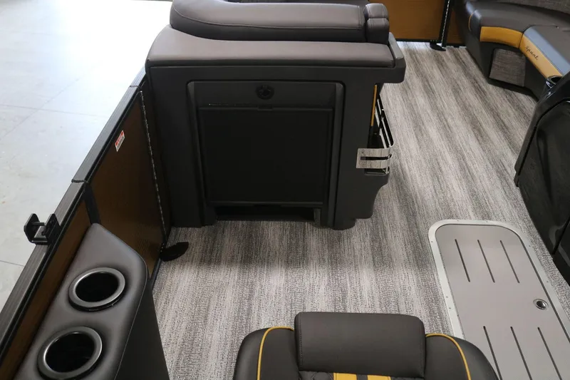 Slide: The Image of 2025 Bennington 22 M FASTBACK interior with modern seating and flooring design. - 13