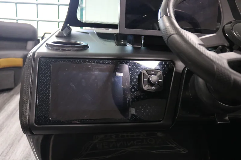 Slide: The Image of Dashboard of 2025 Bennington 22 M Fastback with touchscreen and controls. - 19