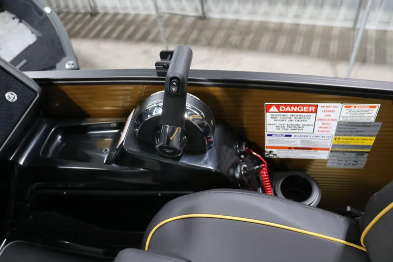 Slide: The Image of 2025 Bennington 22 M FASTBACK boat control panel with safety warnings. - 22