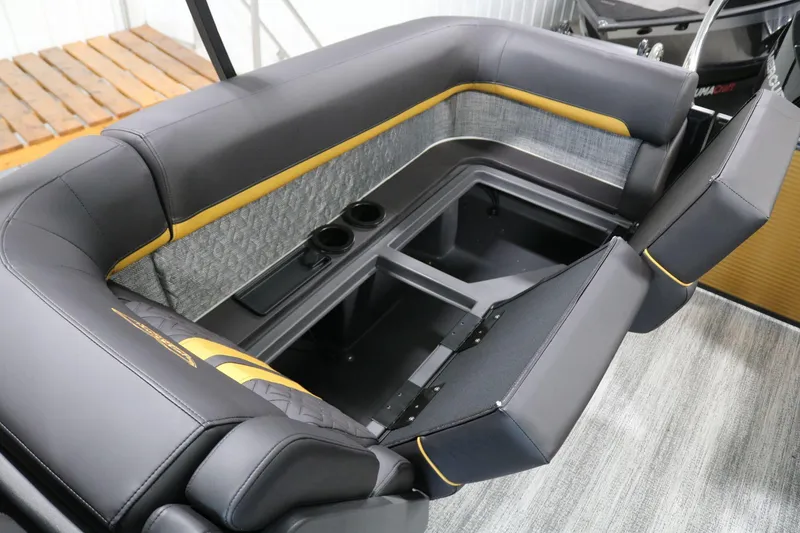 Slide: The Image of 2025 Bennington 22 M FASTBACK boat interior with sleek seating and cup holders. - 24