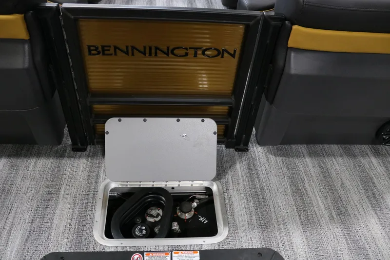 Slide: The Image of 2025 Bennington 22 M FASTBACK boat interior with storage compartment open. - 28