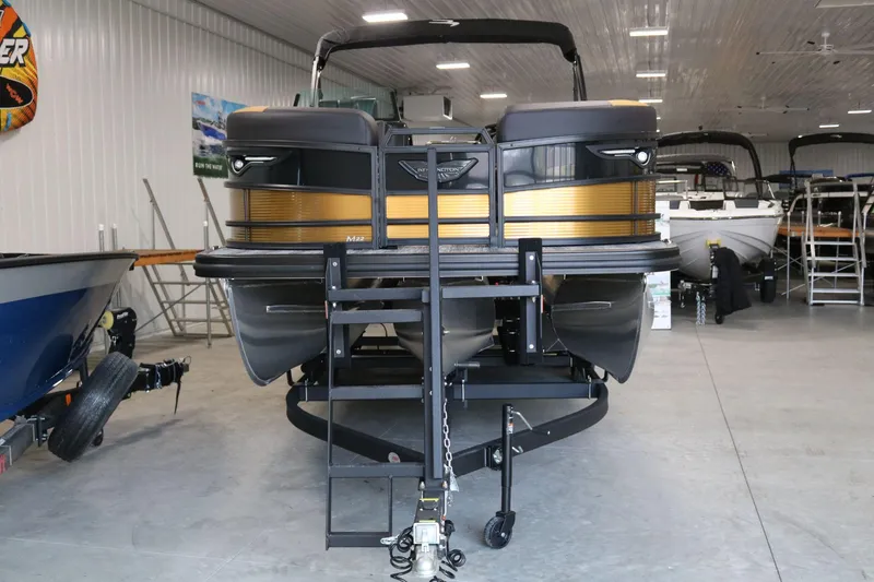 Slide: The Image of 2025 Bennington 22 M FASTBACK pontoon boat in showroom, front view. - 3
