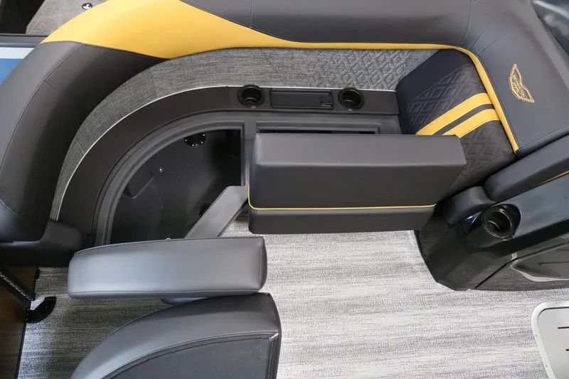 Slide: The Image of 2025 Bennington 22 M FASTBACK interior seating with modern design and cup holders. - 7