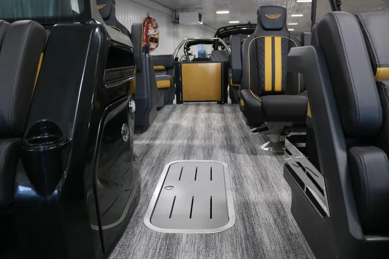 Slide: The Image of Interior of 2025 Bennington 22 M Fastback boat with sleek seating and modern design. - 9