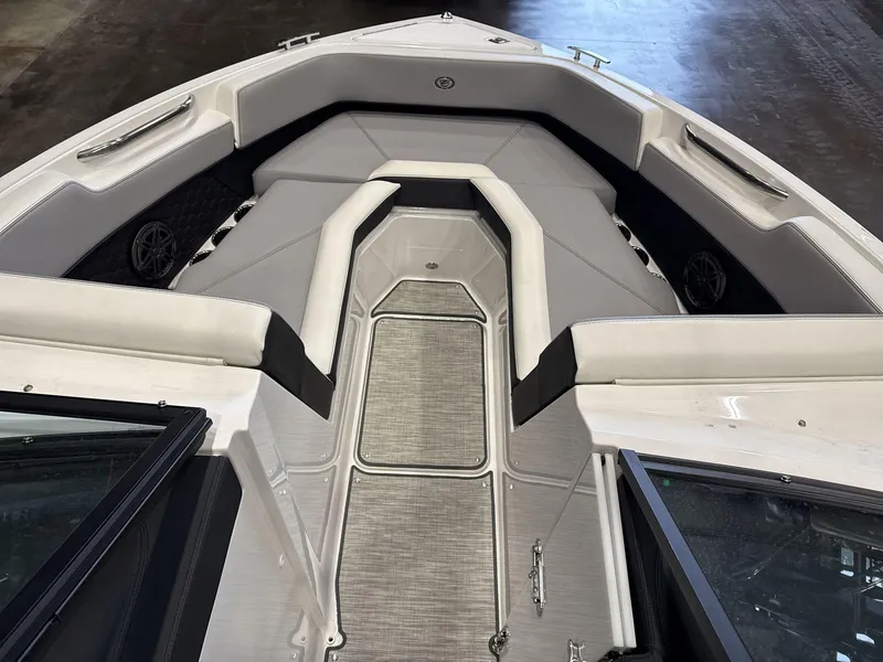 Slide: The Image of 2024 Cobalt R4 Surf boat interior with gray seating and modern design. - 8