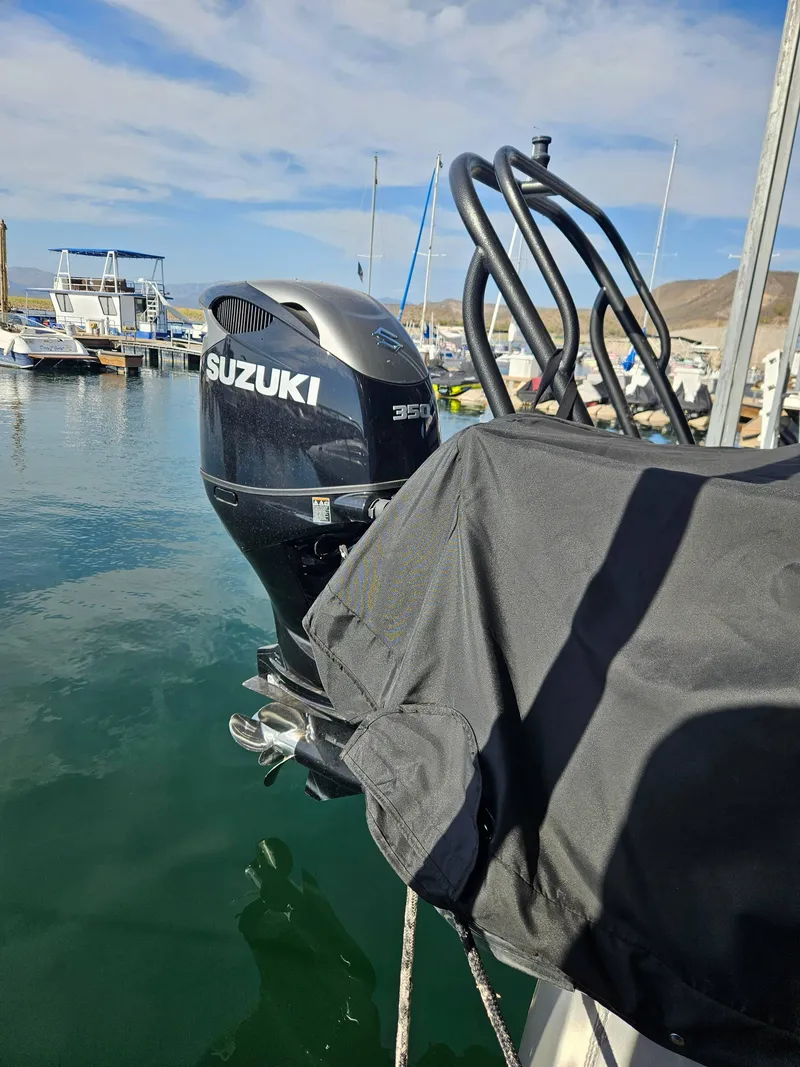 Slide: The Image of Suzuki 350 outboard motor on 2018 Crest Savanagh boat at marina. - 4