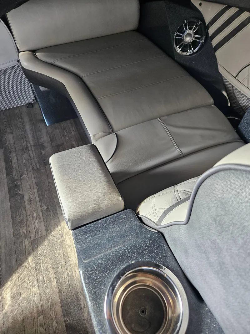 Slide: The Image of Luxurious interior of 2018 Crest Savanagh boat with leather seating and cup holder. - 5