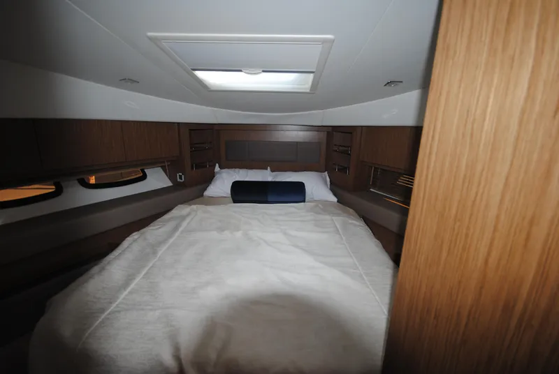 Slide: The Image of Luxurious cabin interior of 2017 Sea Ray Sundancer 510 yacht with cozy bed. - 24