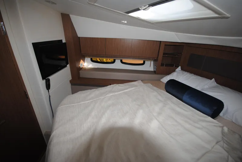 Slide: The Image of Luxurious 2017 Sea Ray Sundancer 510 cabin with cozy bed and modern amenities. - 25
