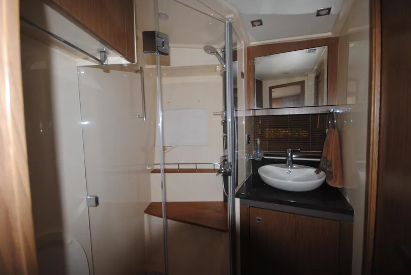 Slide: The Image of Luxurious bathroom in 2017 Sea Ray Sundancer 510 yacht with modern fixtures. - 26