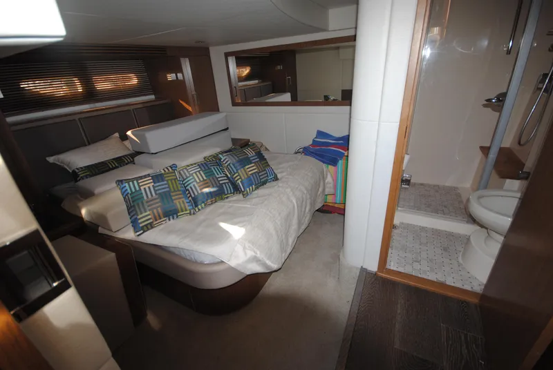Slide: The Image of Luxurious 2017 Sea Ray Sundancer 510 cabin with cozy bed and private bathroom. - 27