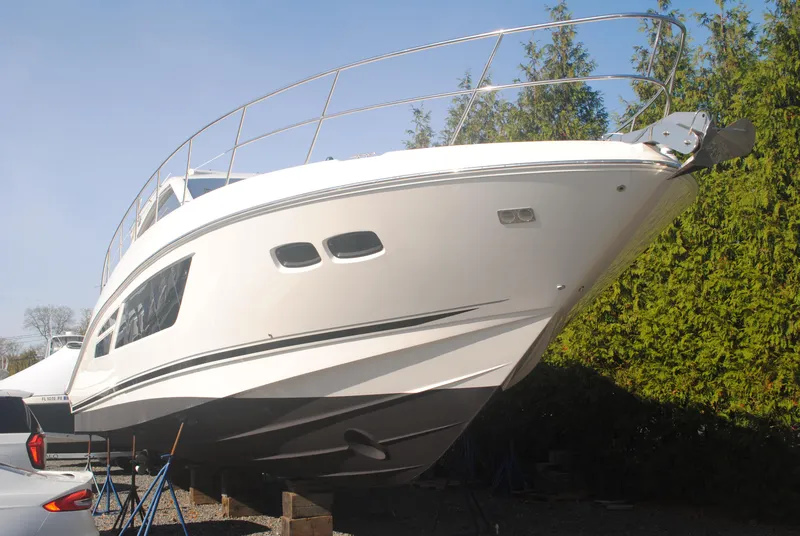 Slide: The Image of 2017 Sea Ray Sundancer 510 yacht on dry dock, side view. - 3