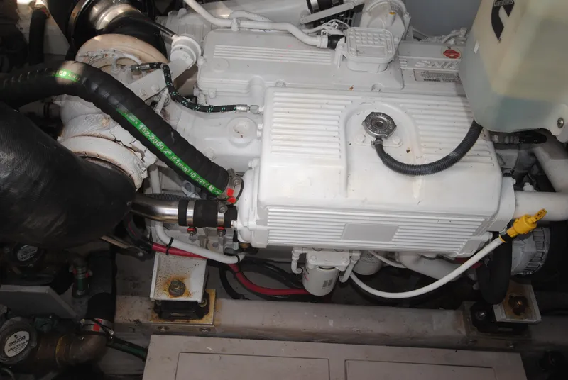Slide: The Image of Engine compartment of 2017 Sea Ray Sundancer 510 yacht, showcasing detailed mechanical components. - 32
